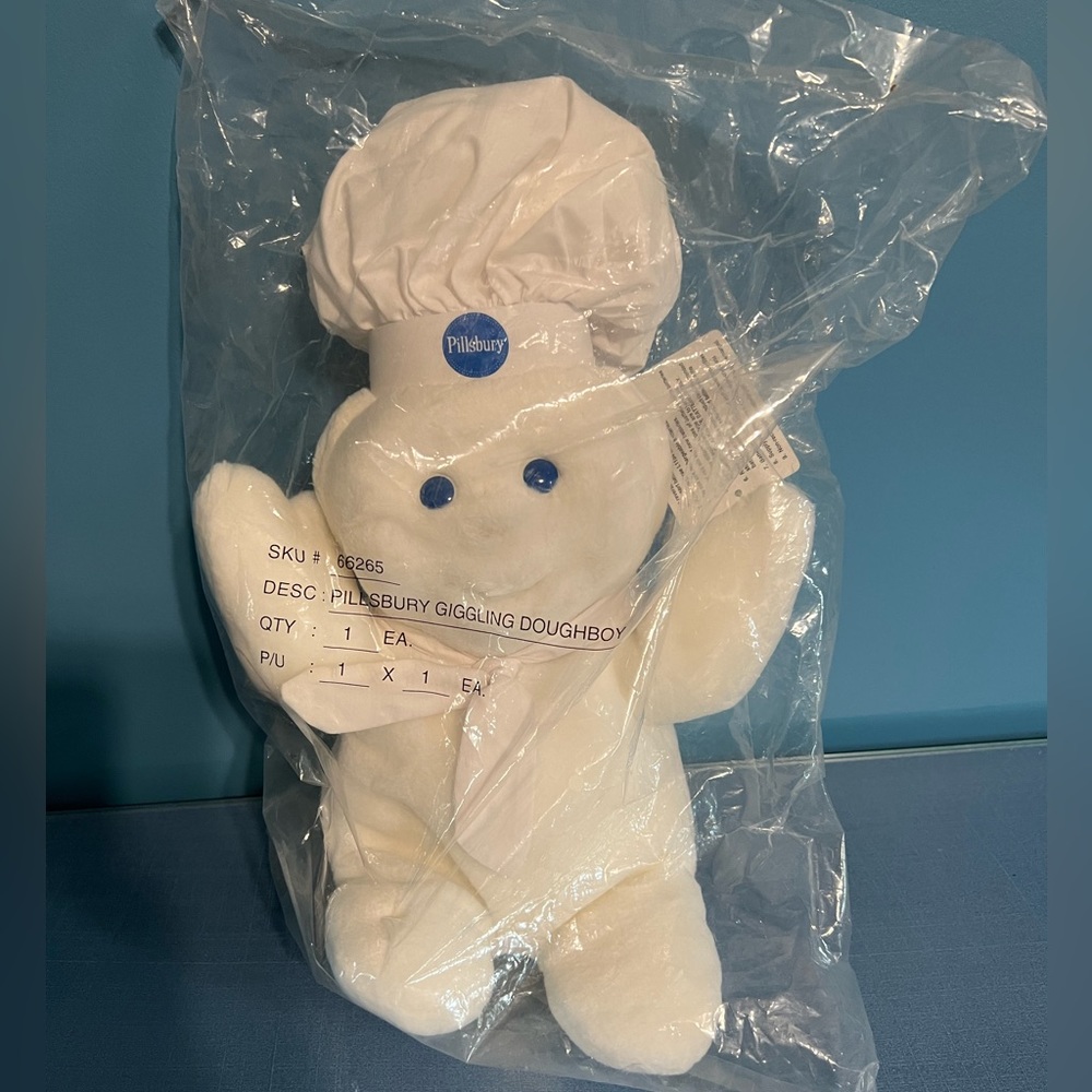 Pillsbury Giggling DoughBoy stuffed toy. New, never used,still in original bag.